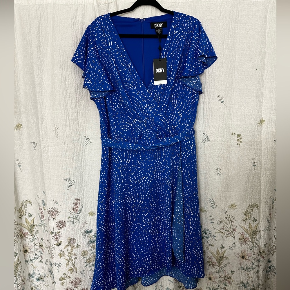 Beautiful blue DKNy dress. New with tags and in great condition.